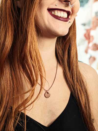 Amberlee smiling wearing jewellery